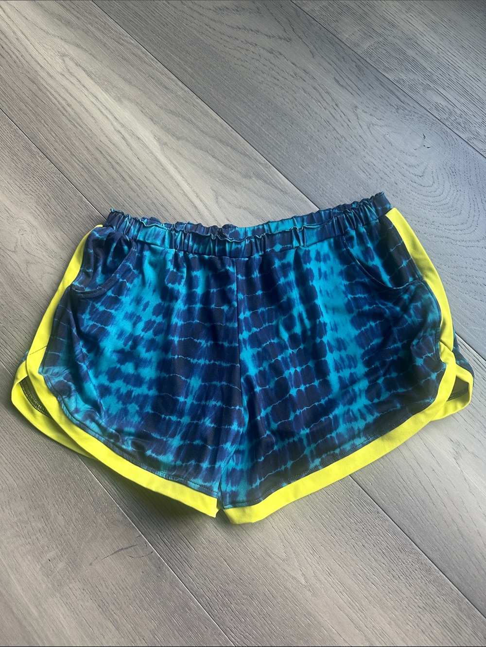 Onzie Blue Tie-Dye Athletic Shorts with Yellow Trim